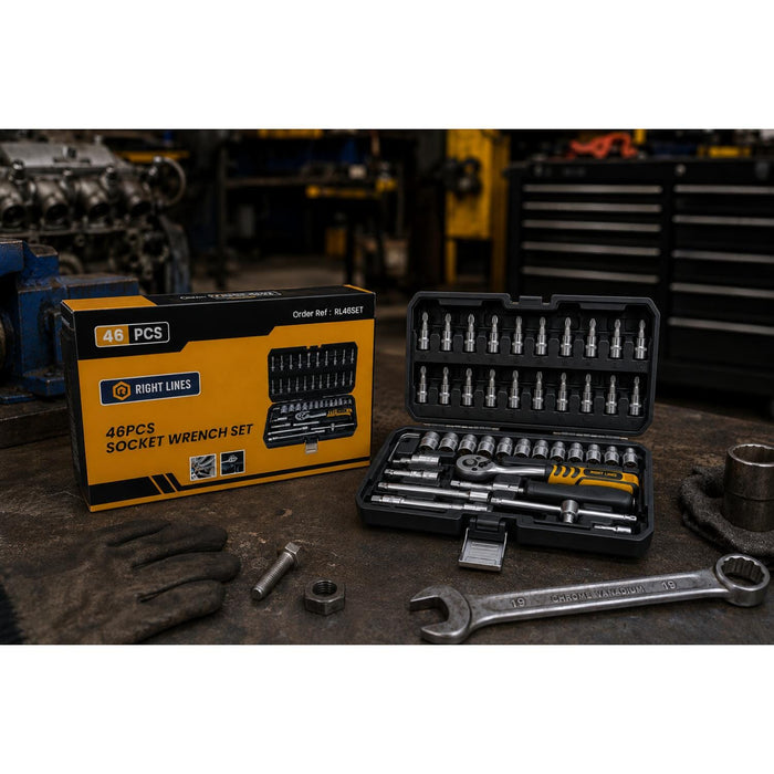 A socket set in a black case on a wooden bench in an engineering workshop